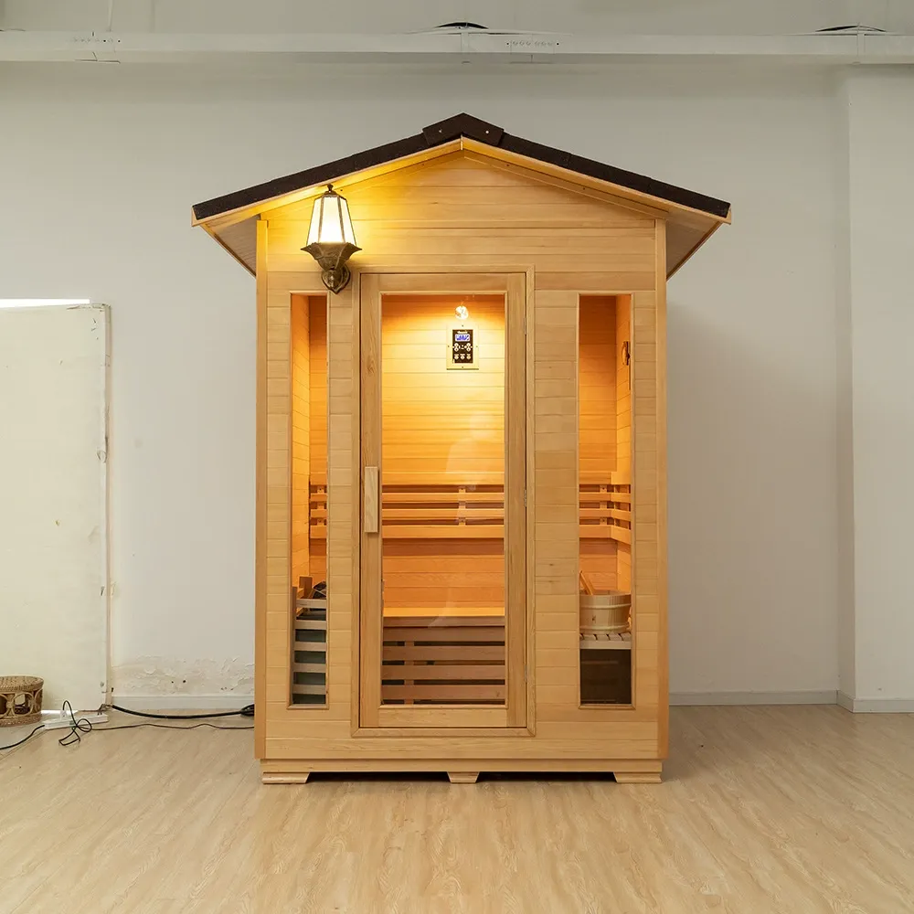 Sauna all'aperto in Ironwood con lampada da parete e porta in vetro